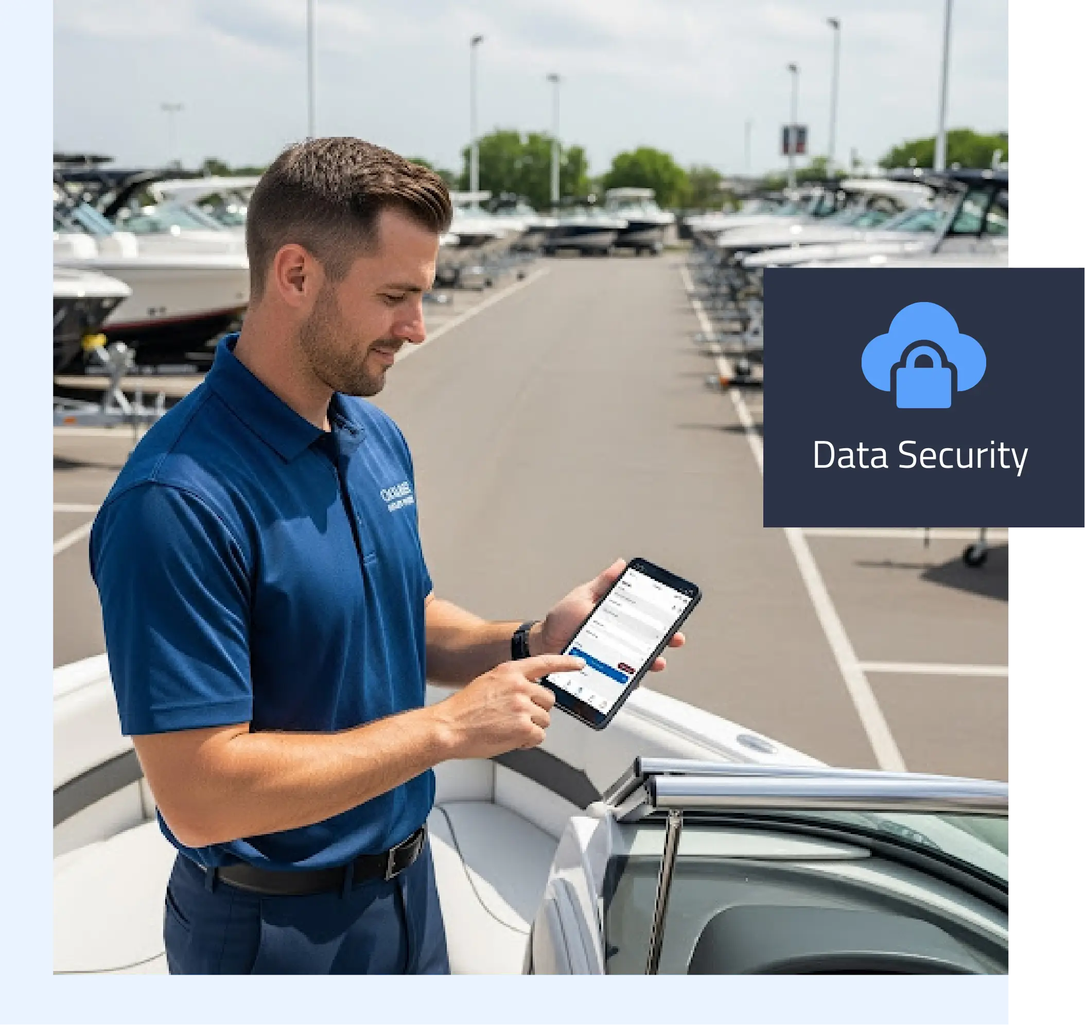 Salesperson updating customer information on mobile device at a boat dealership with data security icon.
