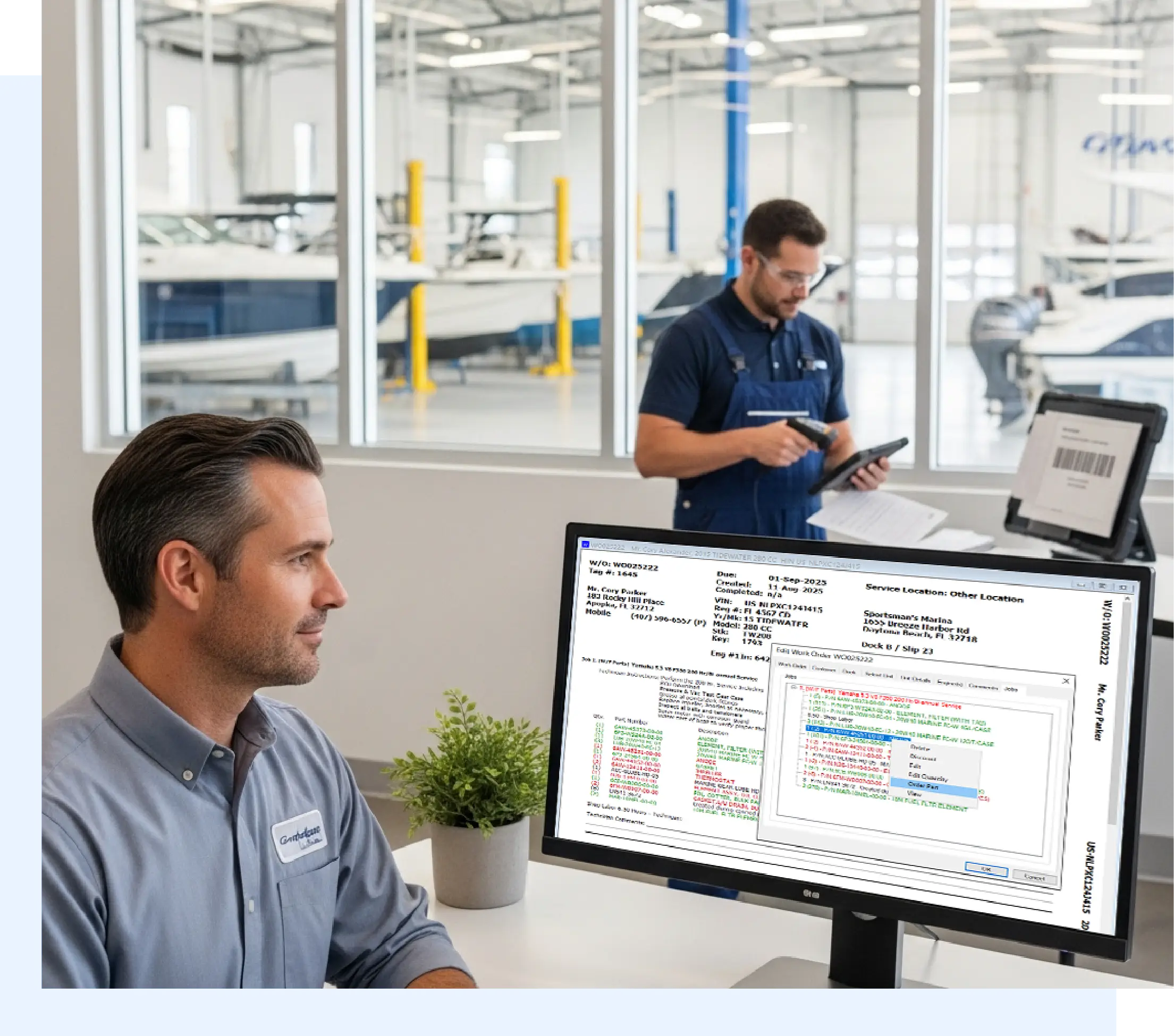 Service manager viewing work orders on a computer while a technician scans a barcode in a marine service center, illustrating winboats’ automated scheduling and real-time job tracking system.